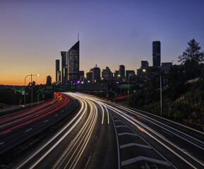Fototapeta na wymiar Brisbane City skyline sunset light trails 
