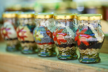 Decorative jars with flower motives
