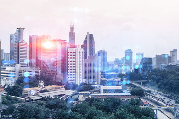 Fototapeta na wymiar World planet Earth map hologram over panorama city view of Kuala Lumpur, Malaysia, Asia. The concept of international connections and business. Multi Exposure.