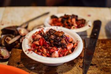 Detail of typical ceviche dish preparing in local market