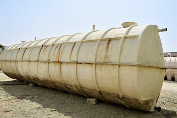 big white water tank in the construction site