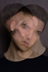 Portrait of young handsome man with multiple exposure effect