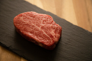 Fillet steak on the black plate