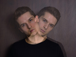 Portrait of young handsome man with multiple exposure effect
