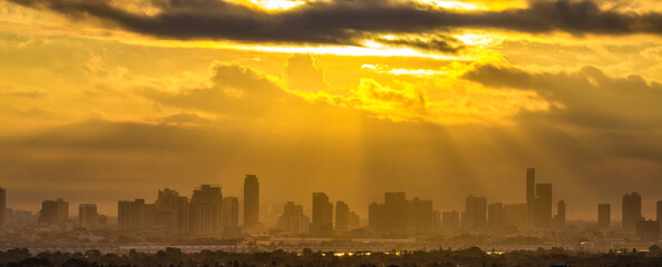 Fototapeta premium blurry panoramic background of the light of the morning sun and the various condominiums, showing the distribution of many yard shelters today.