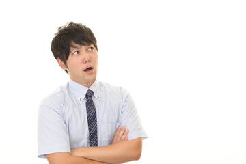 驚いた表情のビジネスマン