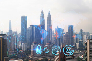World planet Earth map hologram over panorama city view of Kuala Lumpur, Malaysia, Asia. The concept of international connections and business. Multi Exposure.