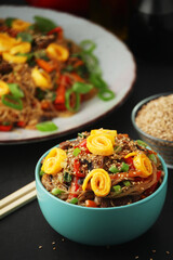 Japchae, a sweet and savory dish of stir-fried glass noodles, Korean cuisine