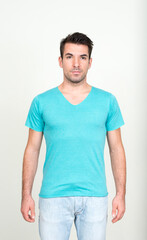 Obraz premium Portrait of young handsome Hispanic man against white background