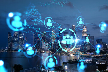 Obraz na płótnie Canvas Glowing Social media icons on night panoramic city view of Singapore, Asia. The concept of networking and establishing new connections between people and businesses. Double exposure.