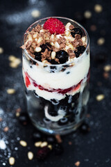 Raspberry, currant, ice cream, chocolate and nuts in dessert
