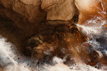 Marble texture. Acrylic ink water. Brown white natural mineral stone design art background. Creative abstract gold fleck sand land rock with streak pattern. Luxury stained surface.