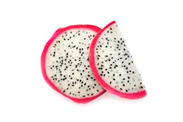 Slices of delicious ripe dragon fruit (pitahaya) on white background, top view