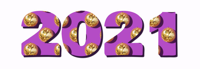 Naklejka premium Figures 2021 for your design. Creative Christmas pattern. Inscription 2021 made with shiny gold disco balls over violet background. New year baubles, star sparkles. Cristmas greeting card