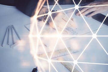 Man's hands working with notes background. Social networking scheme . Mixed media