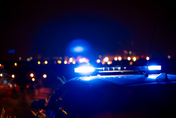 Police patrol car with the city of Madrid Spain in the background © OscarStock