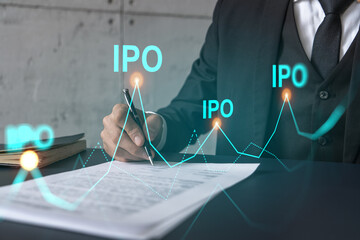 Businessman in suit signs paper. Double exposure with IPO icon hologram. Man signing contract agreement. Primary stock issue market analysis and investment concept.