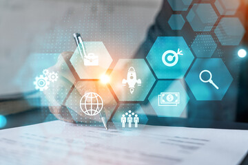 Businessman in suit signs contract. Double exposure with business icons hologram. Man signing agreement. Market analysis and research concept.