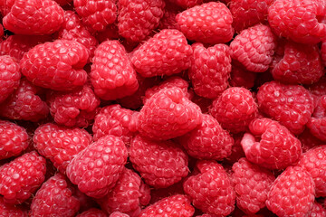 Fresh sweet ripe raspberries as background, closeup