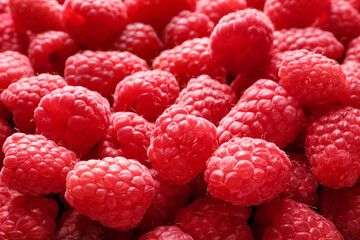 Fresh sweet ripe raspberries as background, closeup