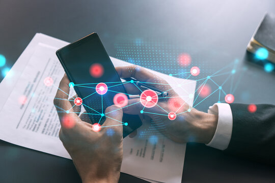 Businessman using app on phone. Abstract technology icons hologram. Multiexposure. People connection concept.