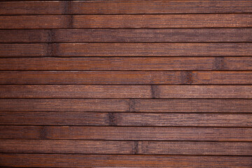 Natural dark brown wooden background, top view of wood planks backdrop