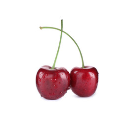 Wet ripe sweet cherries isolated on white