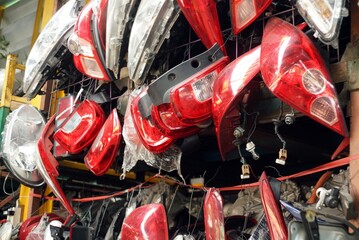 A light of a car spare parts in a car repair service.