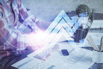 Growing arrows with businessman working on computer on background. Success concept. Double exposure.