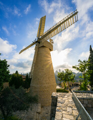 Fototapeta na wymiar Sunburst at the historic windmill in Yemin Moshe - the iconic landmark, constructed with as a source of income for residents of Jerusalem's first Jewish neighbourhood outside the Old City