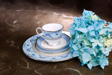 antique porcelain plate and cup on the table