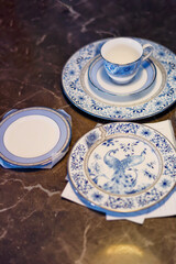 antique porcelain plate and cup on the table
