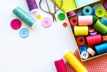 Sewing accessories on a white background