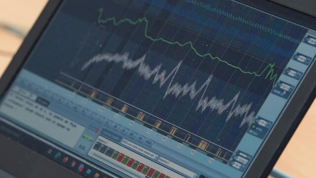 Laptop with lie detector diagram (polygraph). Reports testimony from a person.