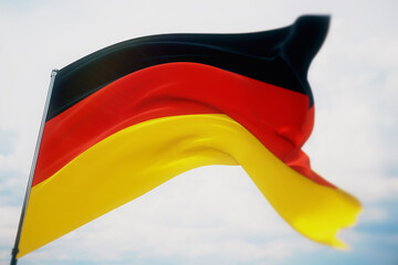Waving flags of the world - flag of Germany. Shot with a shallow depth of field, selective focus. 3D illustration.