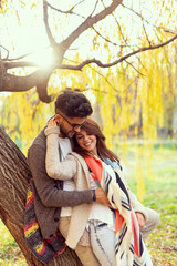 Couple hugging in the park