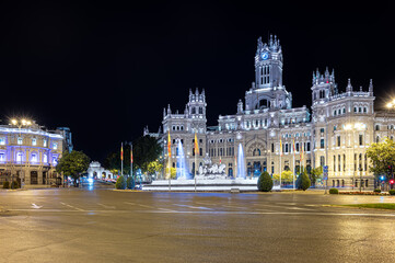 Fototapeta na wymiar Madrid night picture in which we can see Cibeles square, Alcala gate, the Town Hall and house of America