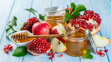 Rosh hashanah concept - honey, apples, pomegranate, symbols copy space