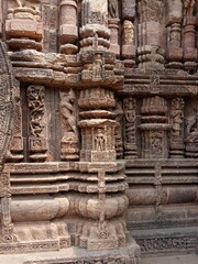 Ancient Sun Temple of  Konark ,India.Vertical sculptures of mythical and religious characters on horizontal base line.