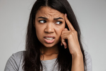 Portrait of young woman thinking