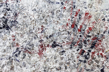Background concrete wall, traces of weathering, worn wall damaged paint old paint. Remains of old paint on the painted concrete surface. Grungy concrete surface.