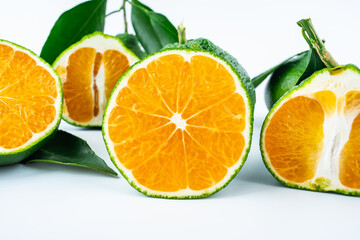 Fresh oranges on white background