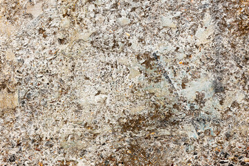 Background concrete wall, traces of weathering, worn wall damaged paint old paint. Remains of old paint on the painted concrete surface. Grungy concrete surface.