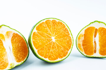 Fresh oranges on white background