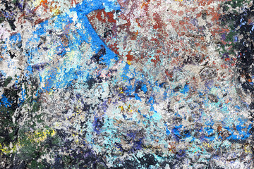 Background concrete wall, traces of weathering, worn wall damaged paint old paint. Remains of old paint on the painted concrete surface. Grungy concrete surface.