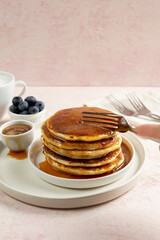 stack of pancakes with syrup