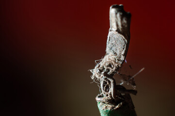 Aluminum soldering on the end of an aluminum wire close-up, macro shot