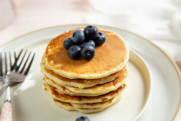 stack of pancakes with blueberries