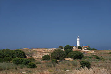 Fototapeta na wymiar Lighthouse on the seacoast near Paphos. Cyprus