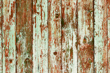 Great colorful background or texture. Abstract concrete is aged with cracks, scratches and remnants of old paint in different shades. Rough concrete surface